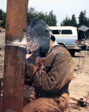 Welder arc welding steel piling